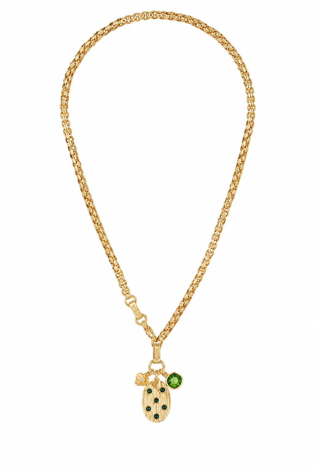 A gold chain necklace featuring a ladybug charm with black spots and a small green gemstone accent, displayed against a solid white background.