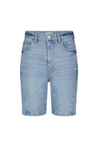 Light blue denim shorts on a white background