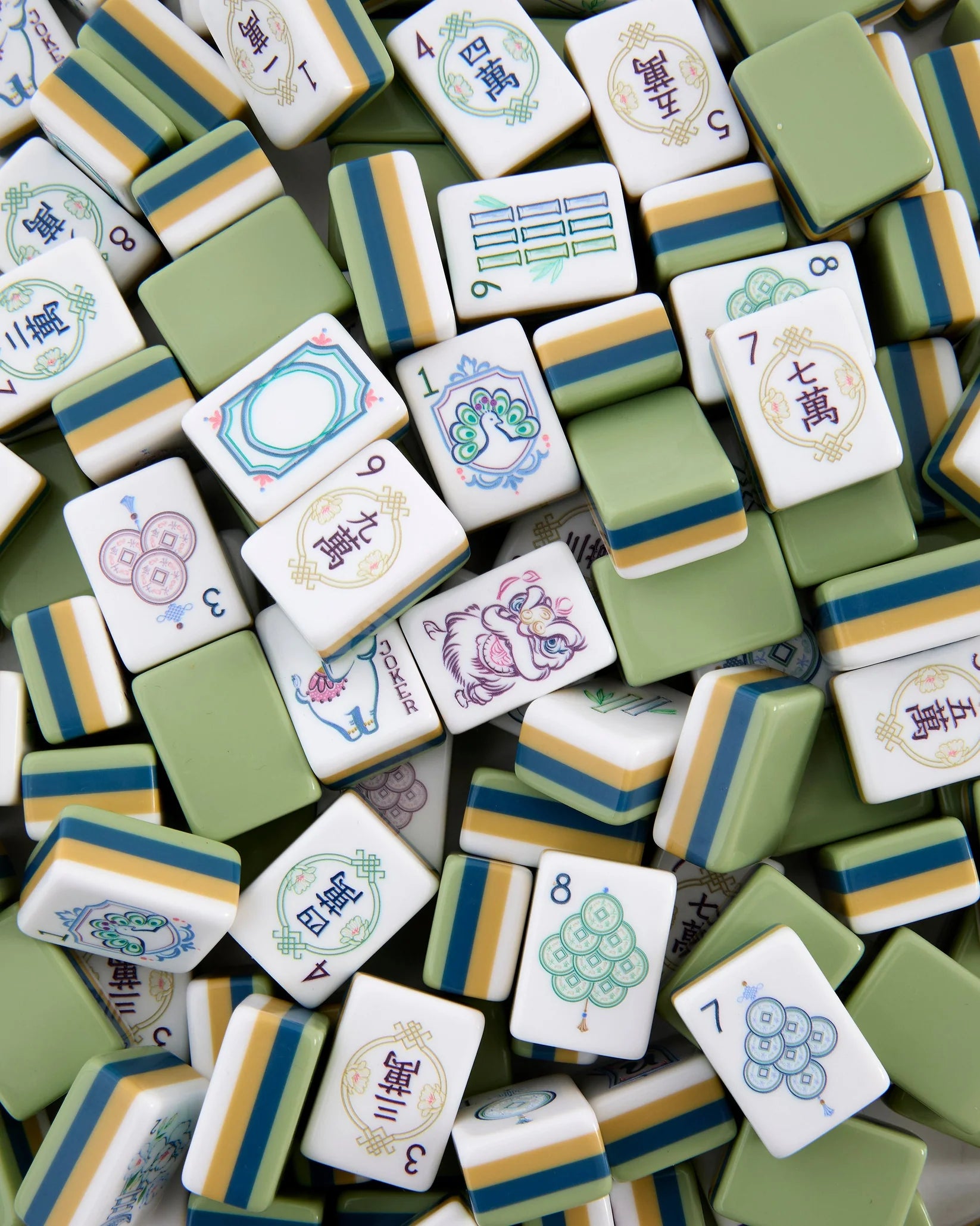 Collection of colorful Mahjong tiles with various symbols and numbers.