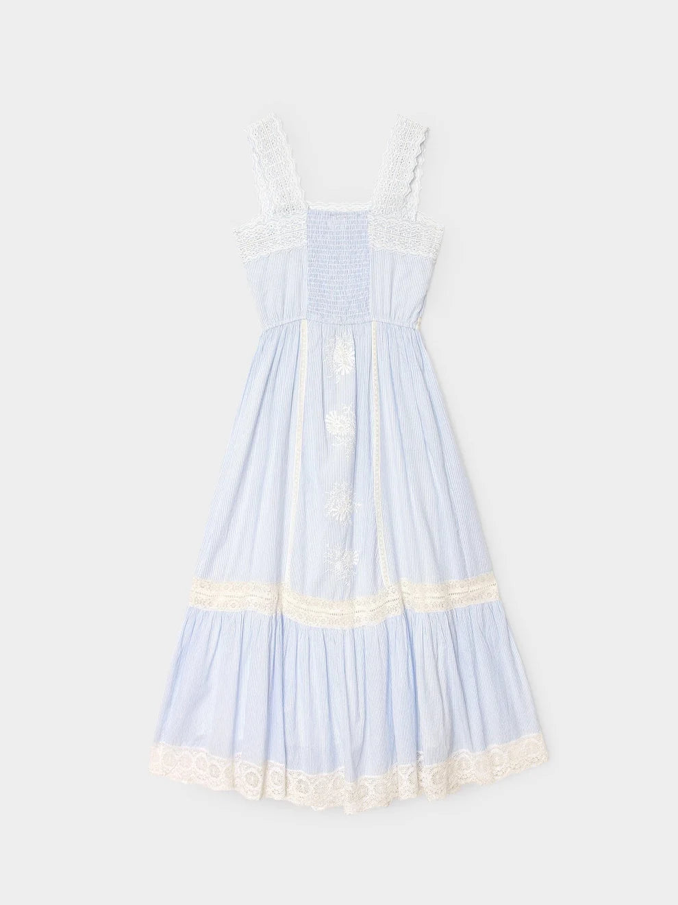 Light blue dress with lace details on a white background