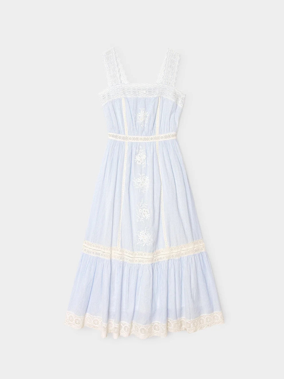 Light blue dress with white lace details on a white background