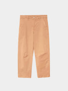 Tan pants on a light gray background