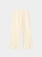 Cream-colored pants on a light gray background
