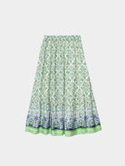 Green patterned skirt on a white background