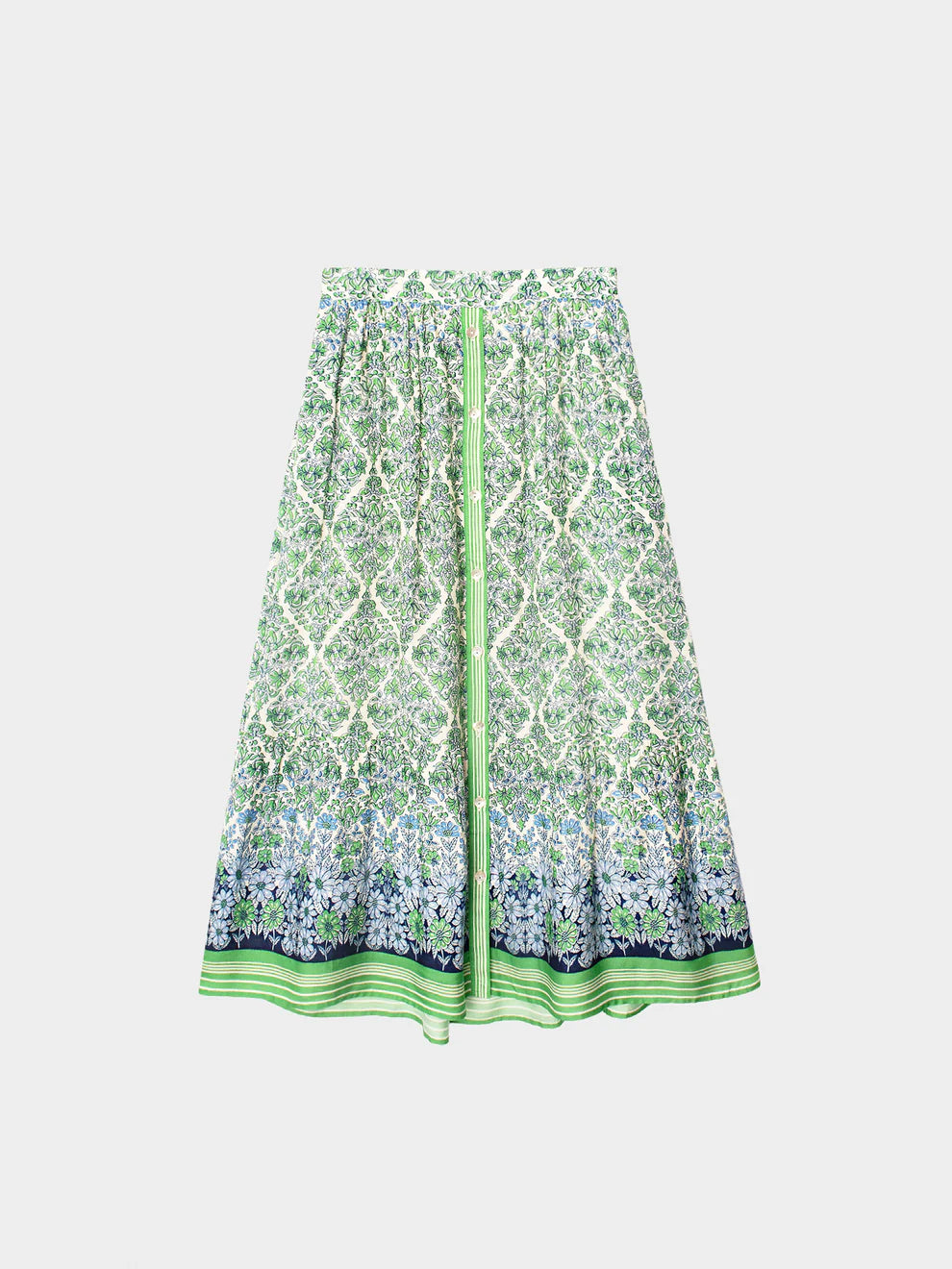 Green and white patterned dress on a white background