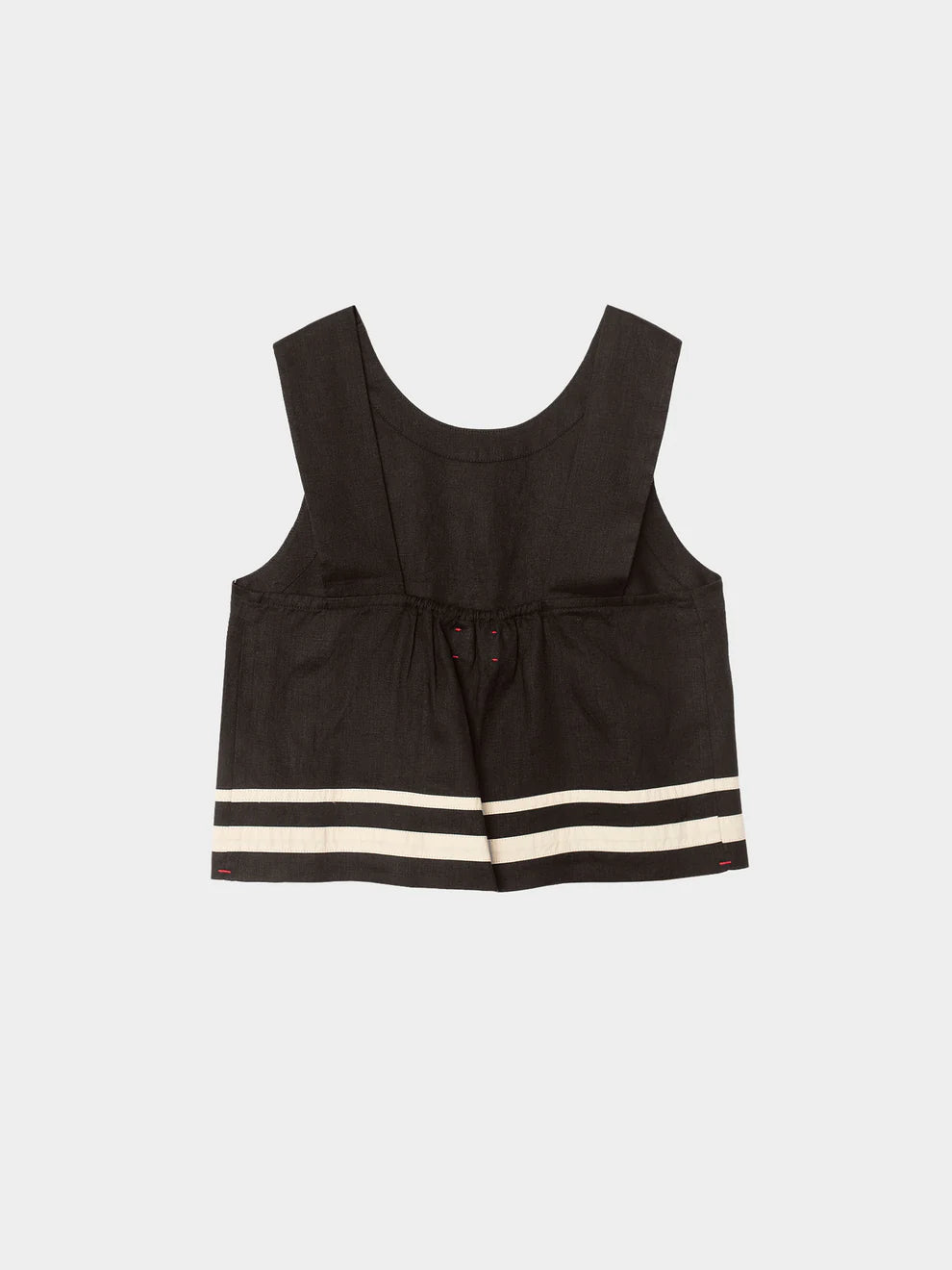 Black sleeveless top with striped shorts on a white background