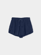 Navy blue shorts with a drawstring on a light gray background