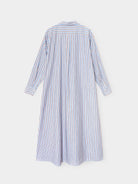 A long-sleeve shirt dress with vertical blue, white, and red stripes, shown from the back against a light gray background.