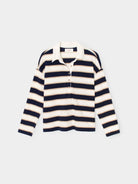 Navy and white striped shirt on a light gray background