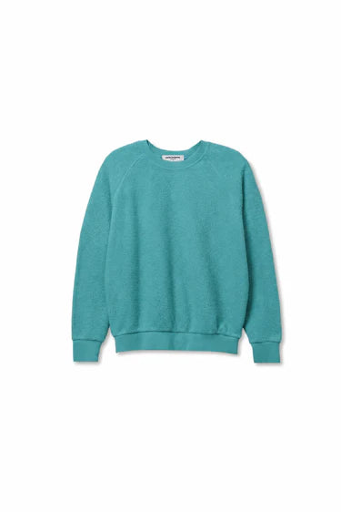 Teal sweater on a white background